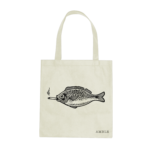 Tote bag with a fish design and 'AMBLE' branding on a white background